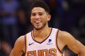 Devin Booker's relationship with Leon Rose adds intrigue to the rumors